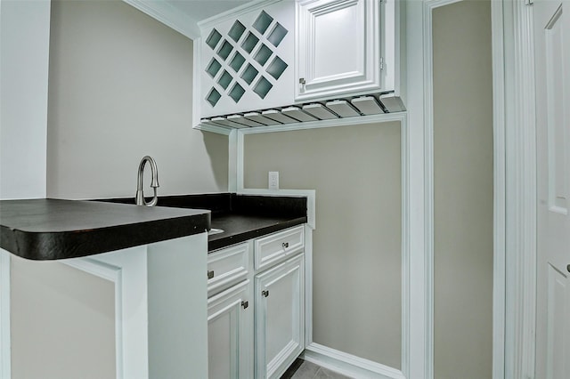 1406 Rustic Knolls Dr, Katy, TX 77450 - bar area featuring crown molding and a sink