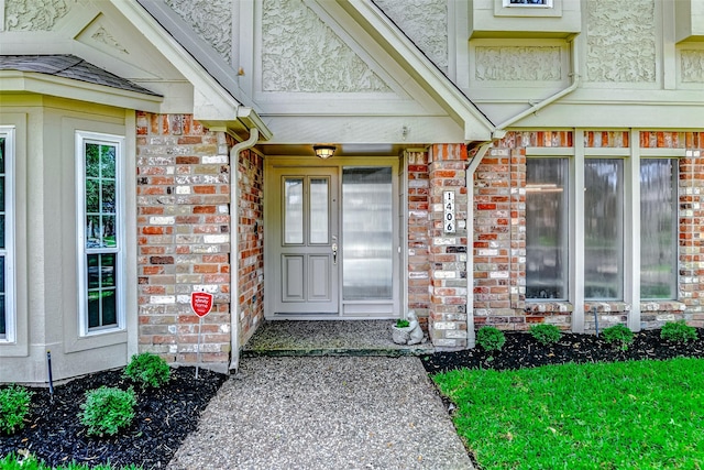 1406 Rustic Knolls Dr, Katy, TX 77450 - view of exterior entry featuring brick siding