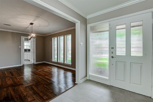 1406 Rustic Knolls Dr, Katy, TX 77450 - entryway with a chandelier, baseboards, and crown molding
