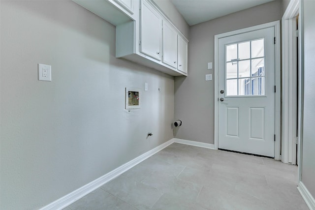 1406 Rustic Knolls Dr, Katy, TX 77450 - washroom with hookup for a gas dryer, washer hookup, baseboards, and cabinet space