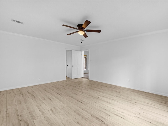 17627 Terrawren Ln, Spring, TX 77379 - spare room featuring a ceiling fan, crown molding, light wood-style floors, and baseboards
