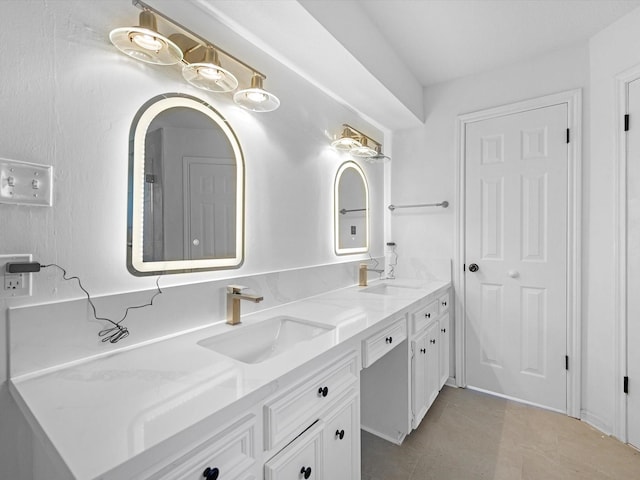 17627 Terrawren Ln, Spring, TX 77379 - full bathroom featuring double vanity and tile patterned floors