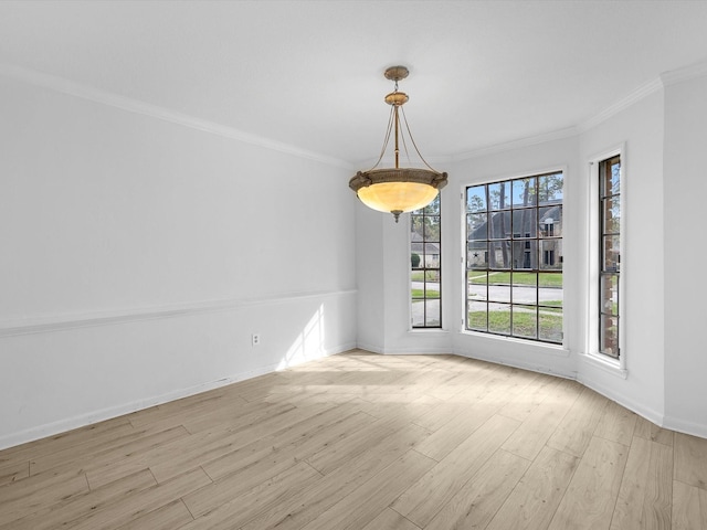 17627 Terrawren Ln, Spring, TX 77379 - unfurnished dining area featuring ornamental molding, wood finished floors, and baseboards