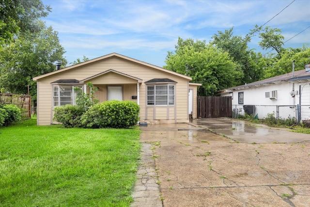 4446 Castor St, Houston, TX 77022 - bungalow featuring an AC wall unit