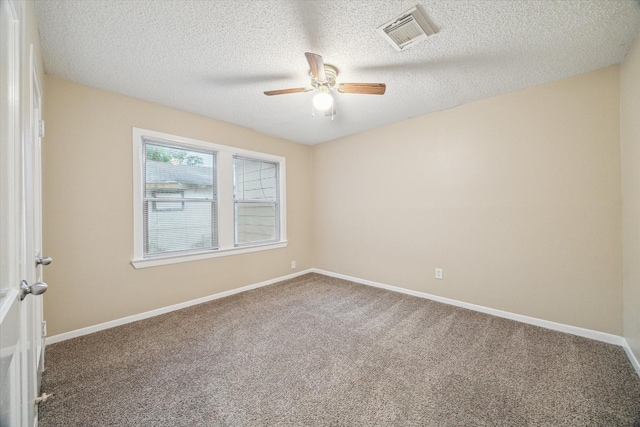 4446 Castor St, Houston, TX 77022 - empty room with ceiling fan, carpet flooring, a textured ceiling, and baseboards