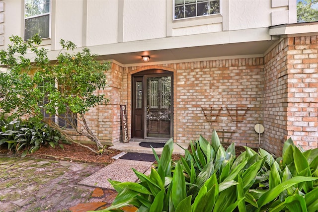 3734 Glade Forest Dr, Kingwood, TX 77339 - property entrance with brick siding and stucco siding