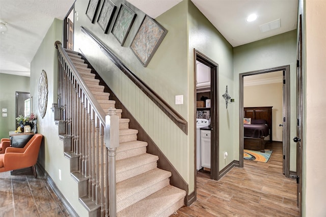 6706 Lindale Manor Ct, Spring, TX 77379 - staircase with wood finished floors and baseboards