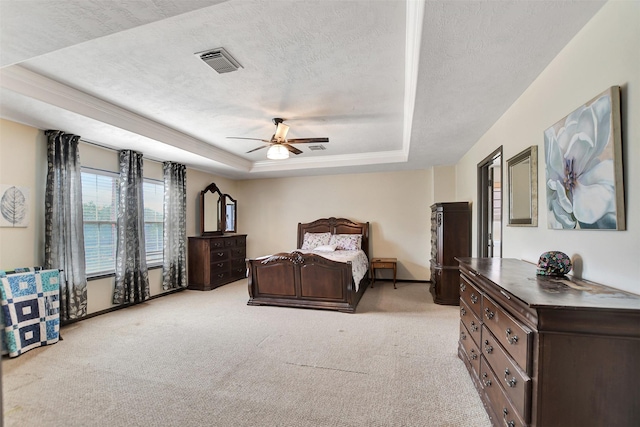 6706 Lindale Manor Ct, Spring, TX 77379 - bedroom featuring a tray ceiling, carpet floors, a ceiling fan, and a textured ceiling