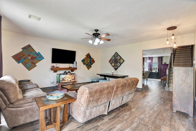 6706 Lindale Manor Ct, Spring, TX 77379 - living area featuring wood finished floors, ceiling fan, and baseboards