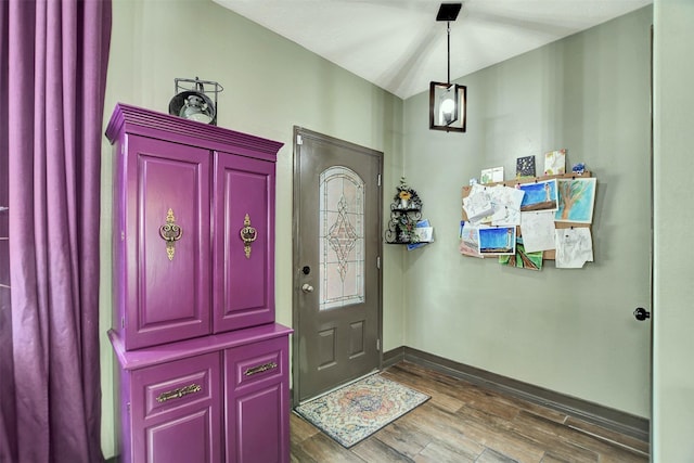 6706 Lindale Manor Ct, Spring, TX 77379 - foyer entrance featuring wood finished floors and baseboards