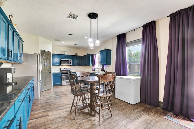 6706 Lindale Manor Ct, Spring, TX 77379 - dining area with light wood-style floors