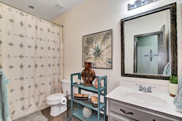 6706 Lindale Manor Ct, Spring, TX 77379 - bathroom with vanity, wood finished floors, and curtained shower