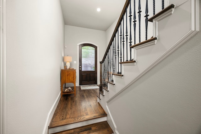 1616 Wrenwood Lks, Houston, TX 77043 - entrance foyer with stairway, wood finished floors, recessed lighting, baseboards, and arched walkways