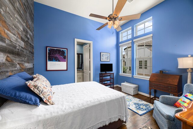 1616 Wrenwood Lks, Houston, TX 77043 - bedroom with wood finished floors, baseboards, and a ceiling fan