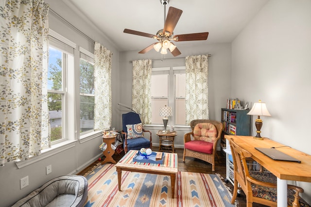 1616 Wrenwood Lks, Houston, TX 77043 - living area with healthy amount of natural light, wood finished floors, ceiling fan, and baseboards
