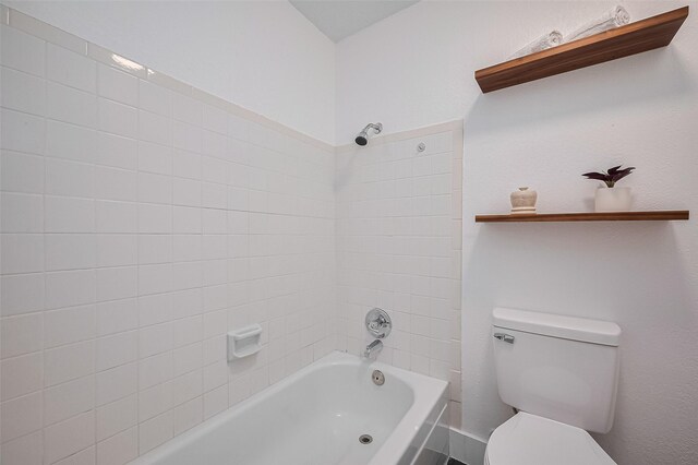 19803 Packwood Dr, Katy, TX 77449 - full bathroom featuring toilet and shower / washtub combination