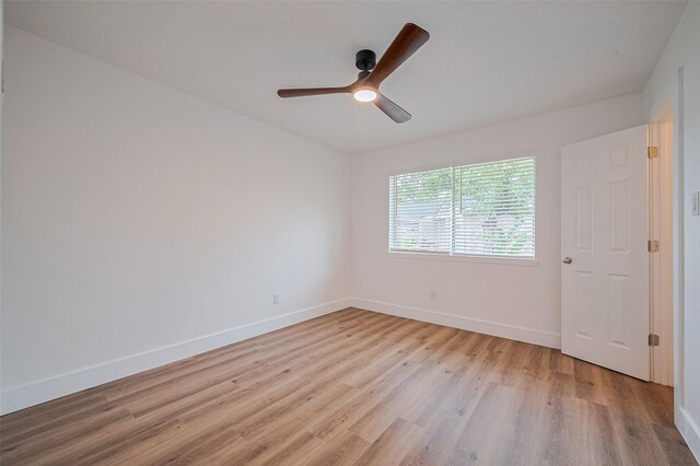 19803 Packwood Dr, Katy, TX 77449 - empty room with light wood-style floors and a ceiling fan