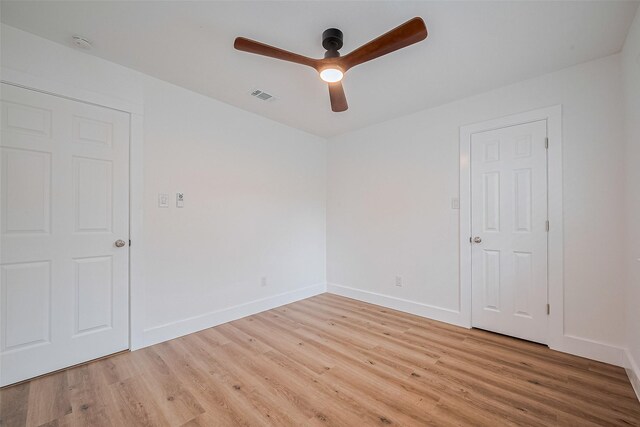 19803 Packwood Dr, Katy, TX 77449 - unfurnished room with light wood-style floors, a ceiling fan, and a smoke detector