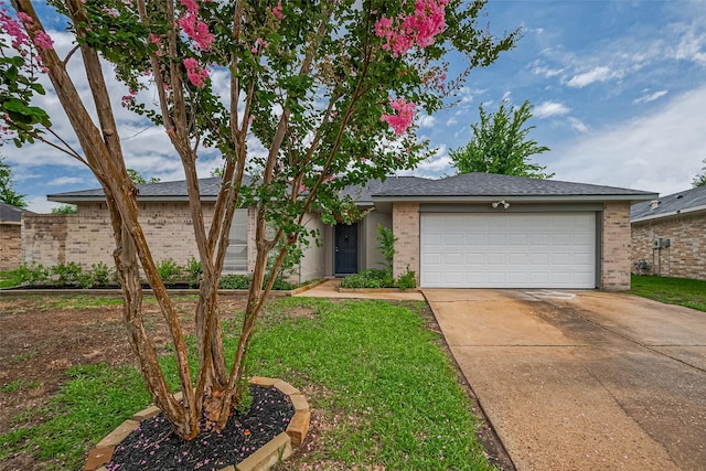19803 Packwood Dr, Katy, TX 77449 - view of front of home with brick siding, driveway, and an attached garage