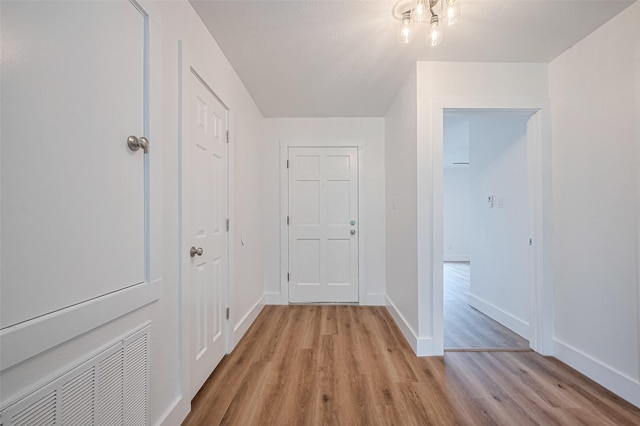 19803 Packwood Dr, Katy, TX 77449 - hallway featuring light wood-type flooring and baseboards