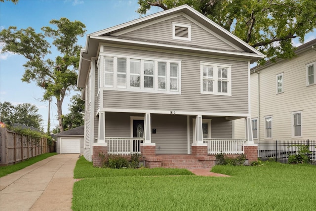 1819 Oxford St, Houston, TX 77008 - view of front facade with a porch, a detached garage, and an outbuilding