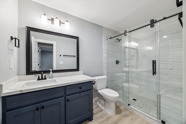 1819 Oxford St, Houston, TX 77008 - full bathroom with vanity, wood finished floors, and a stall shower
