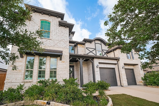 18003 Winding Willow Oak Way, Cypress, TX 77433 - view of front facade with an attached garage and concrete driveway