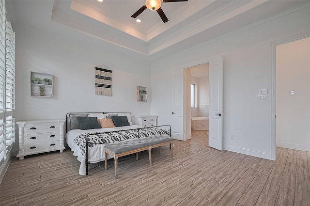 18003 Winding Willow Oak Way, Cypress, TX 77433 - bedroom with a raised ceiling, wood finished floors, ornamental molding, ensuite bathroom, and recessed lighting
