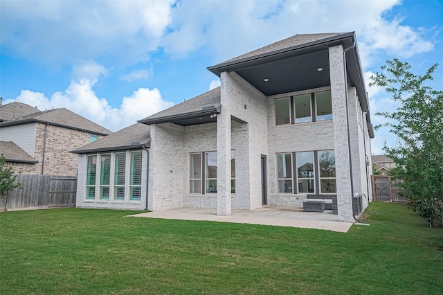 18003 Winding Willow Oak Way, Cypress, TX 77433 - back of house with a patio area, brick siding, a fenced backyard, and a shingled roof