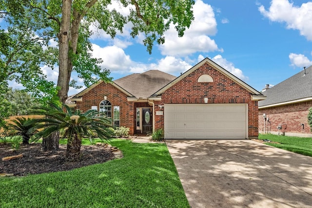 6403 Sagewalk Ct, Spring, TX 77379 - traditional-style house with driveway, a garage, brick siding, and a front yard