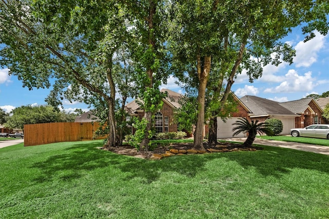 6403 Sagewalk Ct, Spring, TX 77379 - view of front facade with brick siding, driveway, and a garage