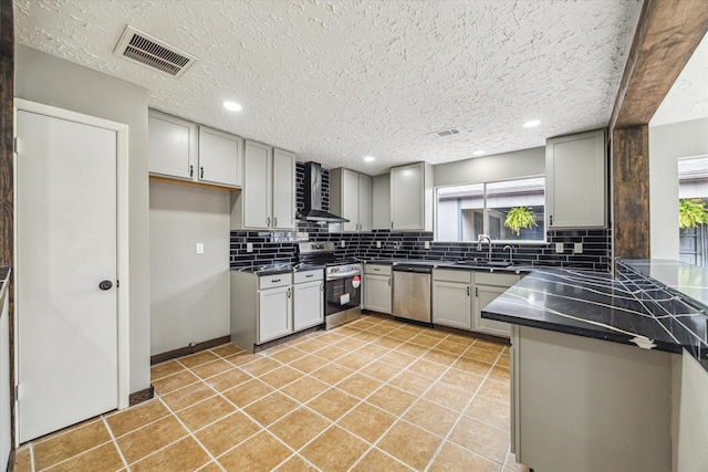 16103 Grassy Creek Dr, Houston, TX 77082 - kitchen featuring stainless steel appliances, backsplash, dark countertops, wall chimney exhaust hood, and recessed lighting