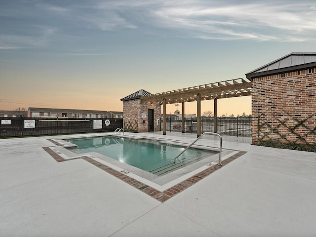 9221 Washington Hts, Houston, TX 77063 - pool at dusk with a pergola, a community pool, and a patio