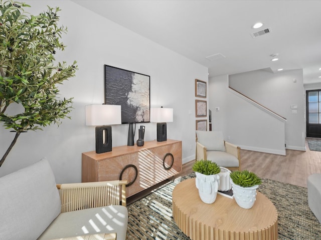9221 Washington Hts, Houston, TX 77063 - living area with wood finished floors, recessed lighting, stairway, and baseboards