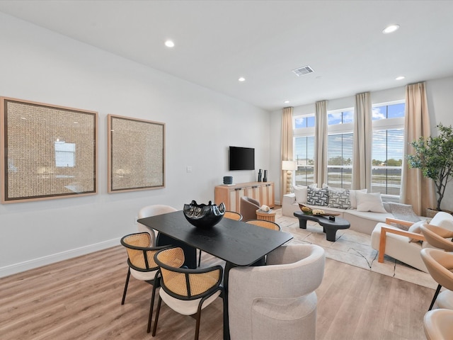 9221 Washington Hts, Houston, TX 77063 - dining room featuring light wood-type flooring, recessed lighting, and baseboards