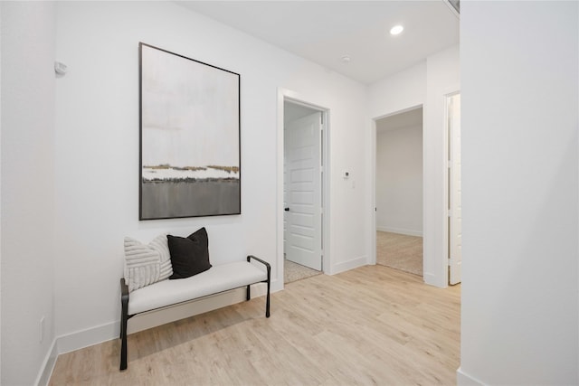 5322 Rue St, Houston, TX 77033 - hallway featuring wood finished floors, baseboards, and recessed lighting