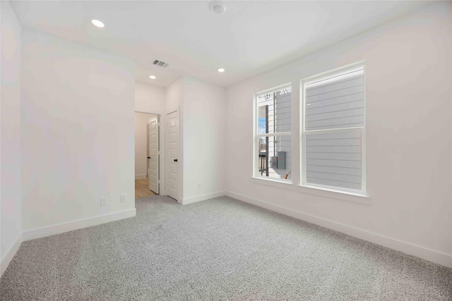 5324 Rue St, Houston, TX 77033 - empty room with carpet floors, baseboards, and recessed lighting