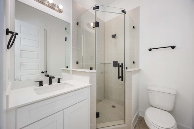 5324 Rue St, Houston, TX 77033 - bathroom featuring vanity, toilet, and a shower stall