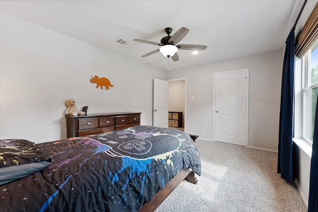 16997 White Birch Ln, Conroe, TX 77385 - bedroom with carpet, a ceiling fan, and baseboards
