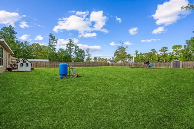 16997 White Birch Ln, Conroe, TX 77385 - view of yard with a playground