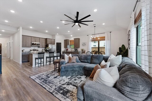 16997 White Birch Ln, Conroe, TX 77385 - living area featuring ceiling fan, light wood finished floors, and recessed lighting