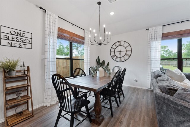 16997 White Birch Ln, Conroe, TX 77385 - dining space featuring a chandelier, baseboards, dark wood-style flooring, and recessed lighting