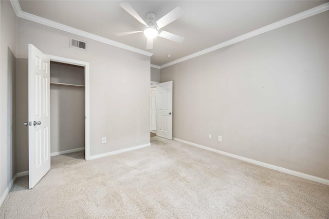 2255 Braeswood Park Dr Unit 105, Houston, TX 77030 - unfurnished bedroom with crown molding, baseboards, carpet, a closet, and ceiling fan