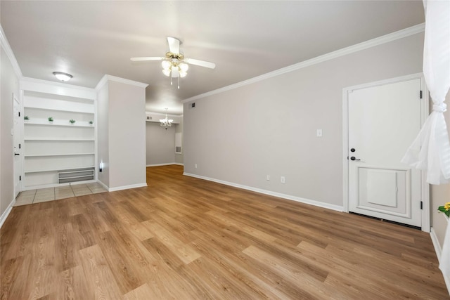 2255 Braeswood Park Dr Unit 105, Houston, TX 77030 - unfurnished living room with a ceiling fan, baseboards, light wood-style floors, and crown molding