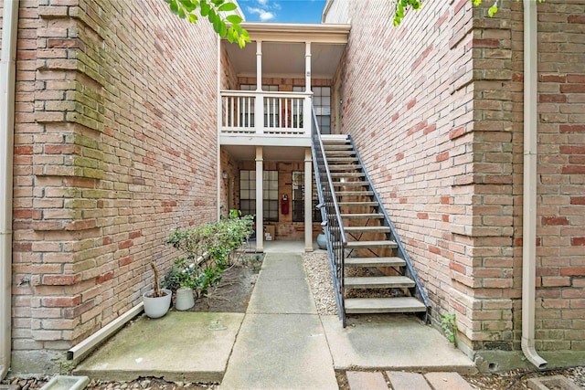 2255 Braeswood Park Dr Unit 105, Houston, TX 77030 - view of exterior entry featuring brick siding