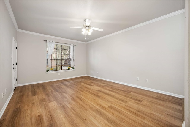 2255 Braeswood Park Dr Unit 105, Houston, TX 77030 - unfurnished room featuring ornamental molding, ceiling fan, light wood-style flooring, and baseboards