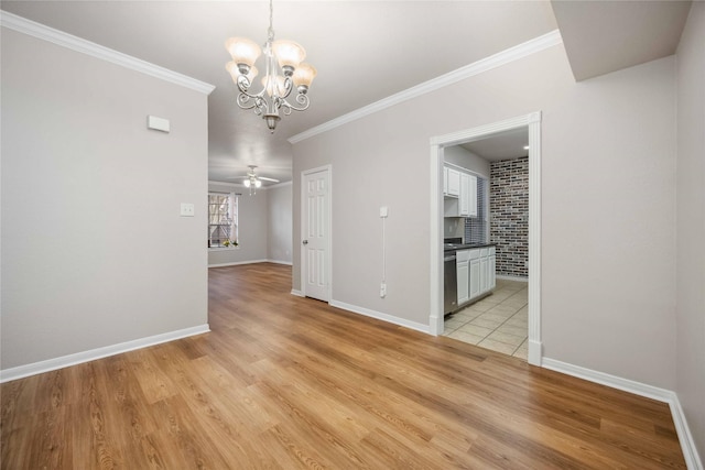 2255 Braeswood Park Dr Unit 105, Houston, TX 77030 - spare room featuring a chandelier, light wood-type flooring, a ceiling fan, crown molding, and baseboards