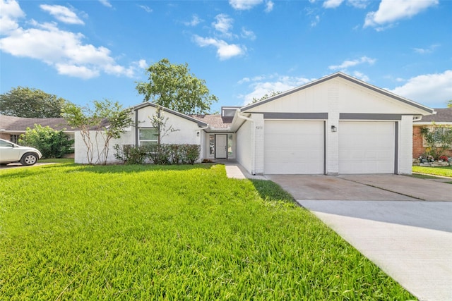 7211 Autumn Grove Dr, Houston, TX 77072 - view of front of home featuring an attached garage, a front lawn, concrete driveway, and brick siding