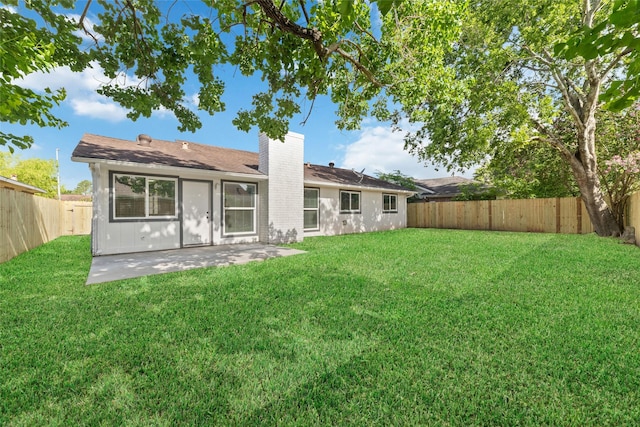 7211 Autumn Grove Dr, Houston, TX 77072 - back of property featuring a chimney and a patio area