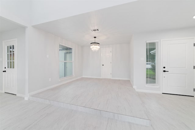 7211 Autumn Grove Dr, Houston, TX 77072 - foyer entrance with a chandelier, baseboards, and healthy amount of natural light